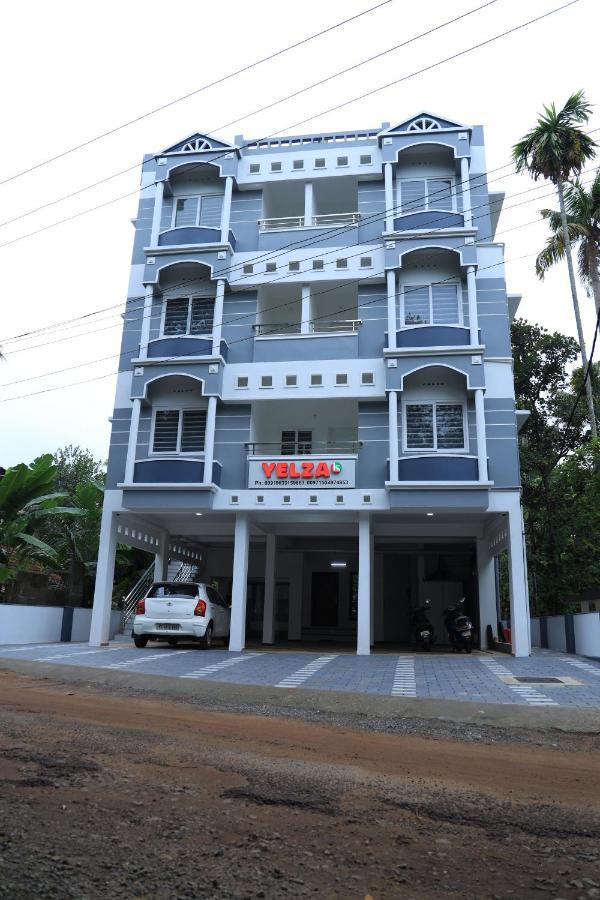 Yelza Hotel And Residence Alwaye Экстерьер фото