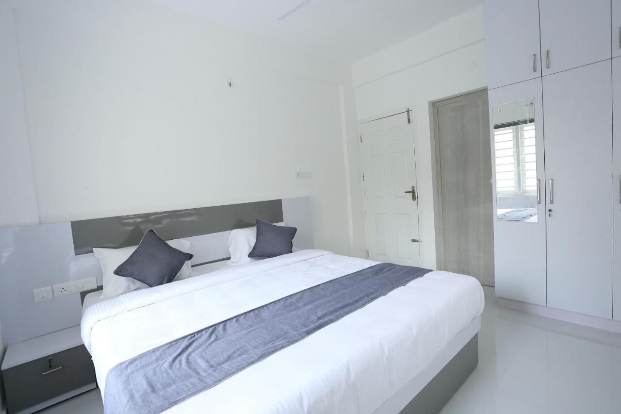 Yelza Hotel And Residence Alwaye Экстерьер фото
