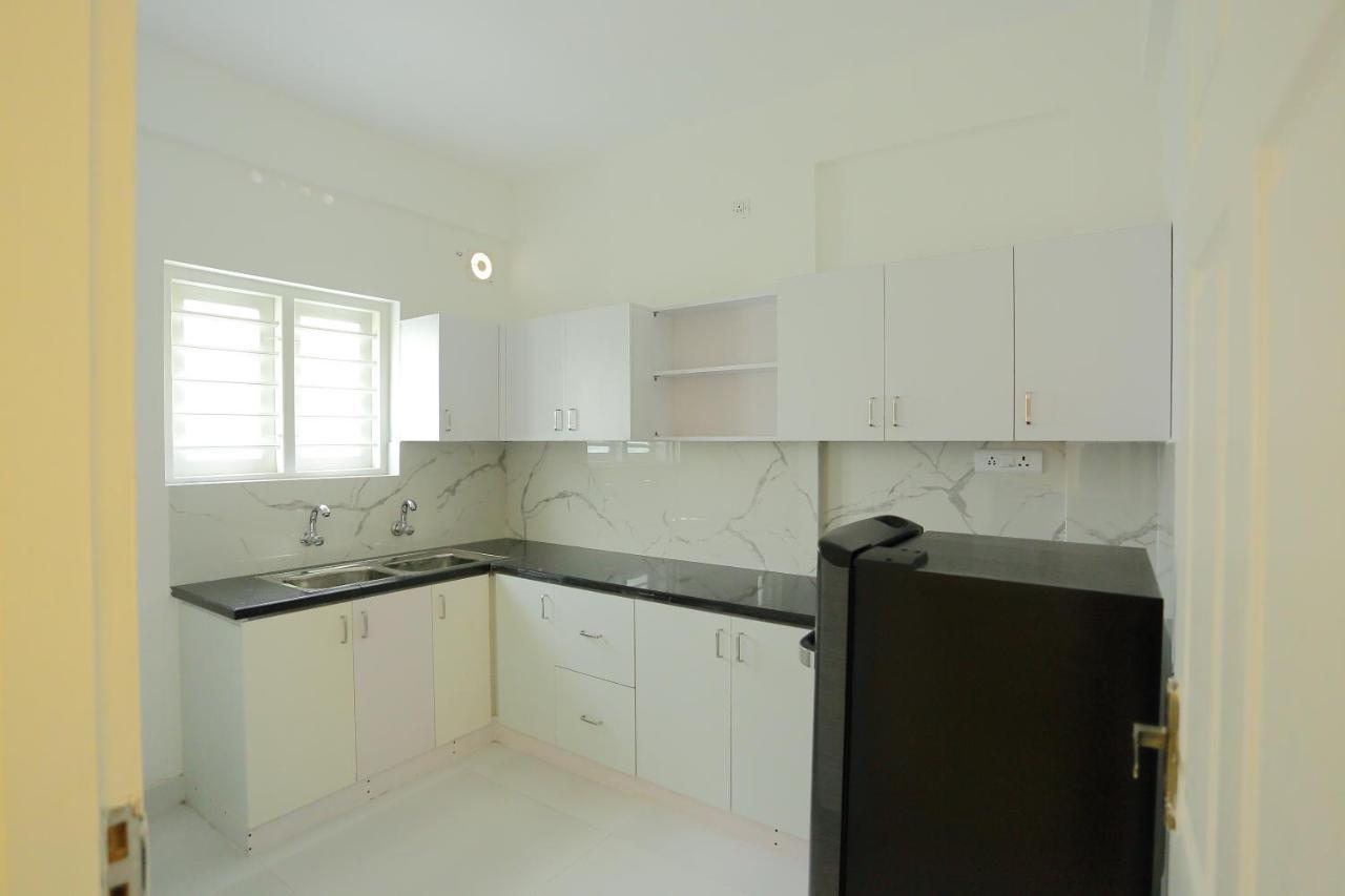 Yelza Hotel And Residence Alwaye Экстерьер фото