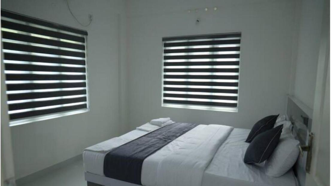 Yelza Hotel And Residence Alwaye Экстерьер фото